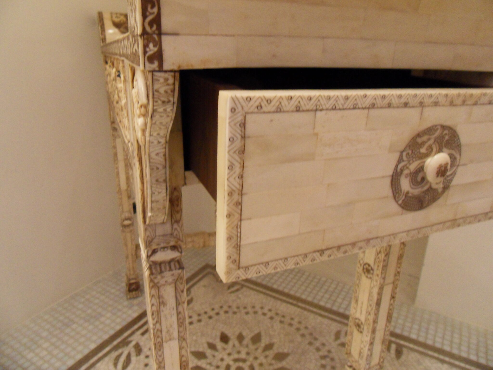 Console carved in wood and white bone