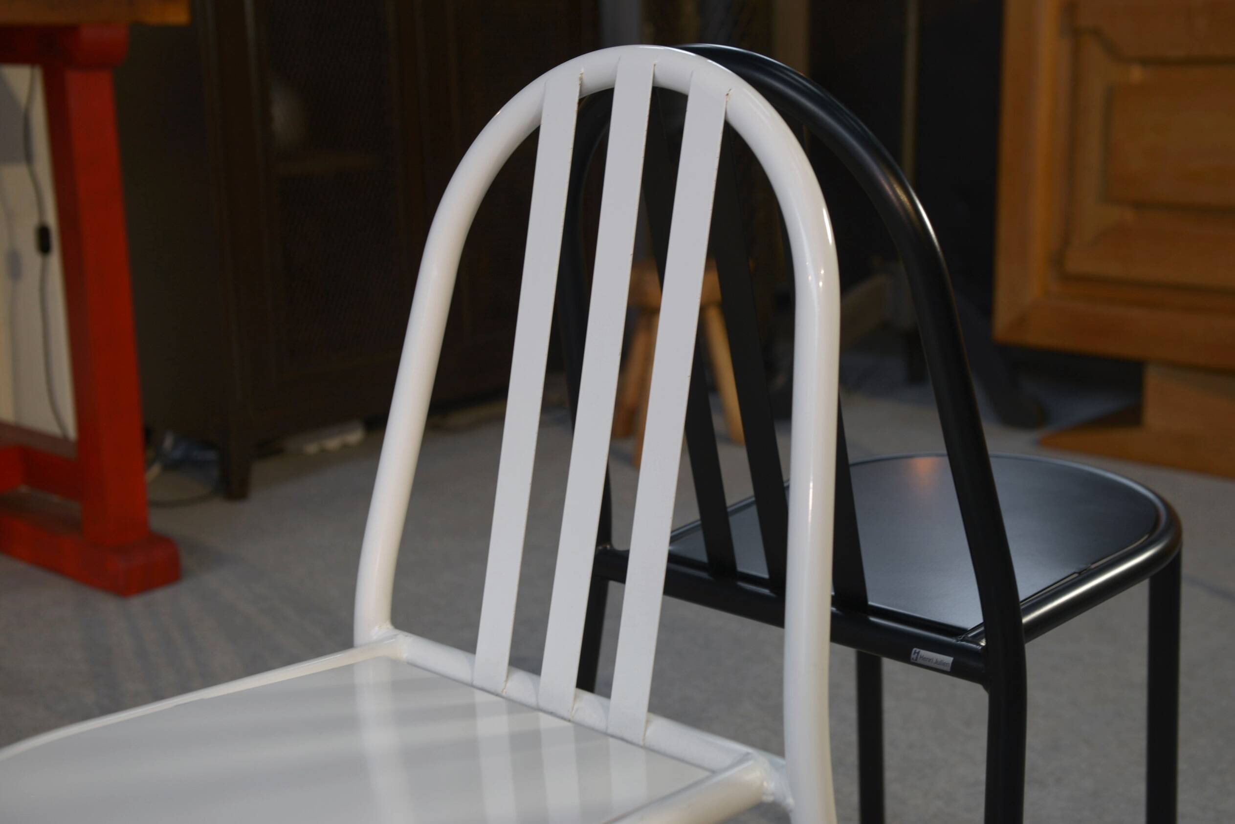 Pair of white and black chairs by Mallet Stevens