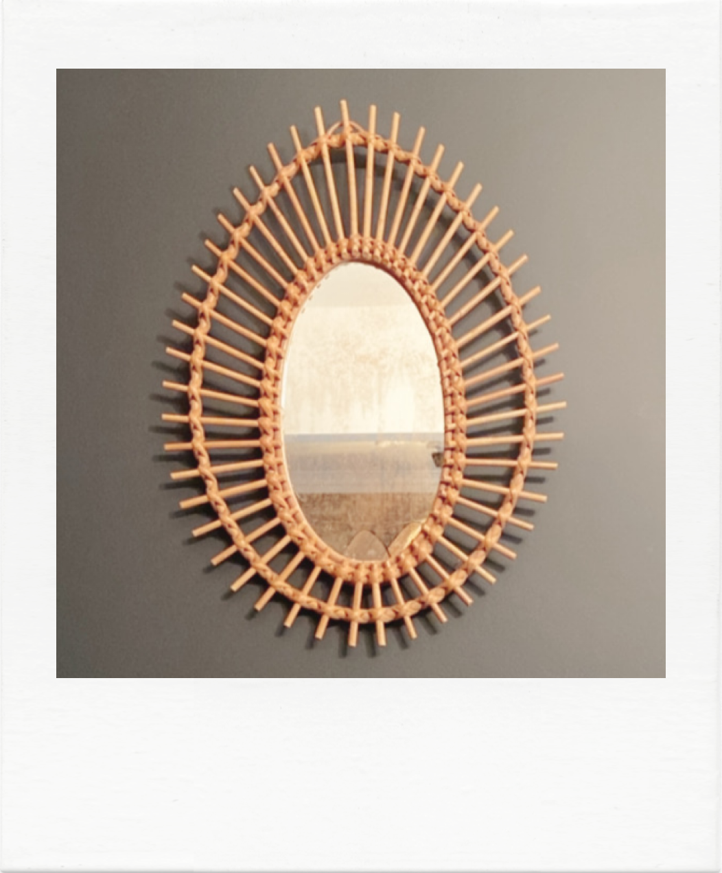 Vintage rattan sun mirror