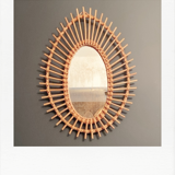 Vintage rattan sun mirror