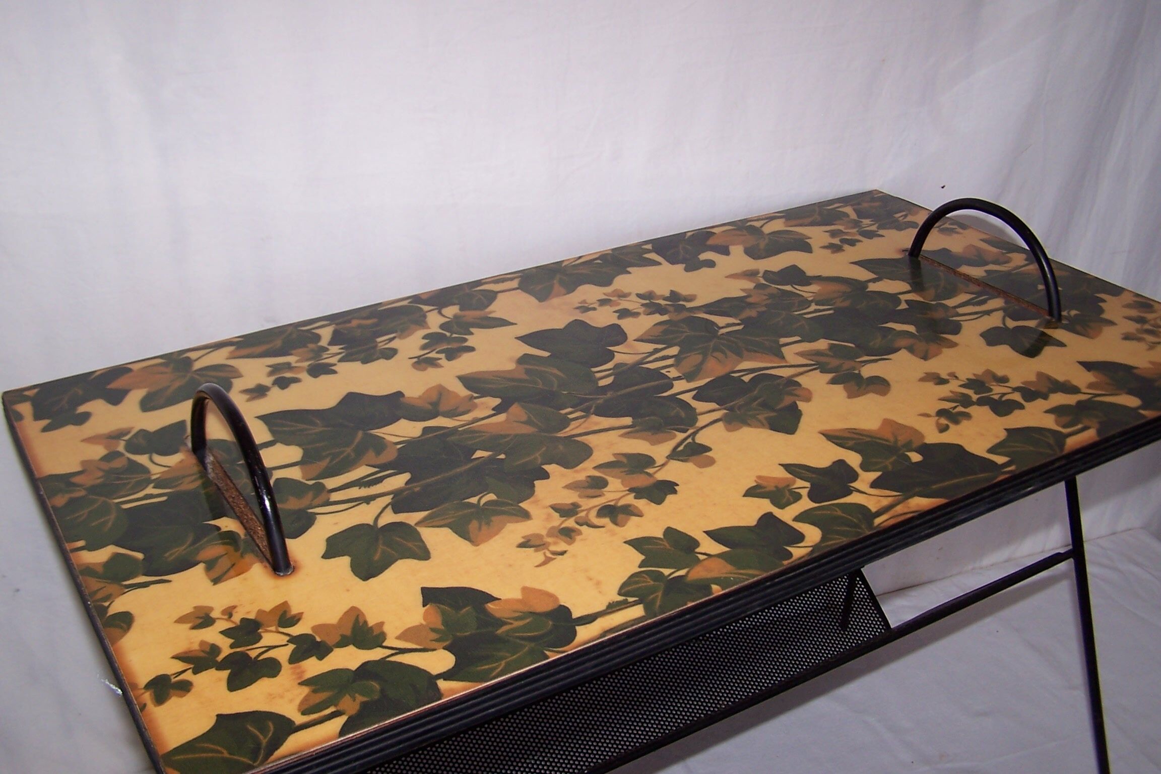 Perforated plate coffee table from the 1950s