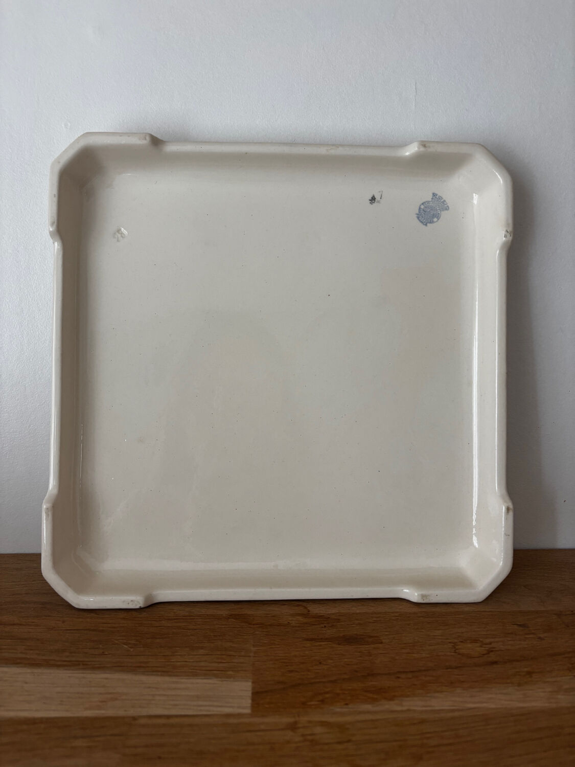 Vintage old trivet Badonviller blue graphic pattern