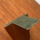Mid-century Scandinavian bookends in teak and brass.