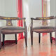 Pair of Empire armchairs in bronze and mahogany.