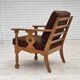 Fauteuil danois des années 1970, revêtement en laine verte, bois de chêne massif.