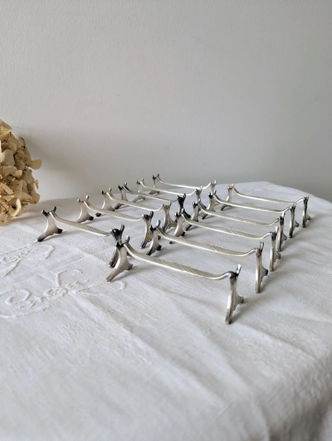 Set of 12 Christofle knife rests, Moderne 1912 model