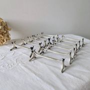 Set of 12 Christofle knife rests, Moderne 1912 model