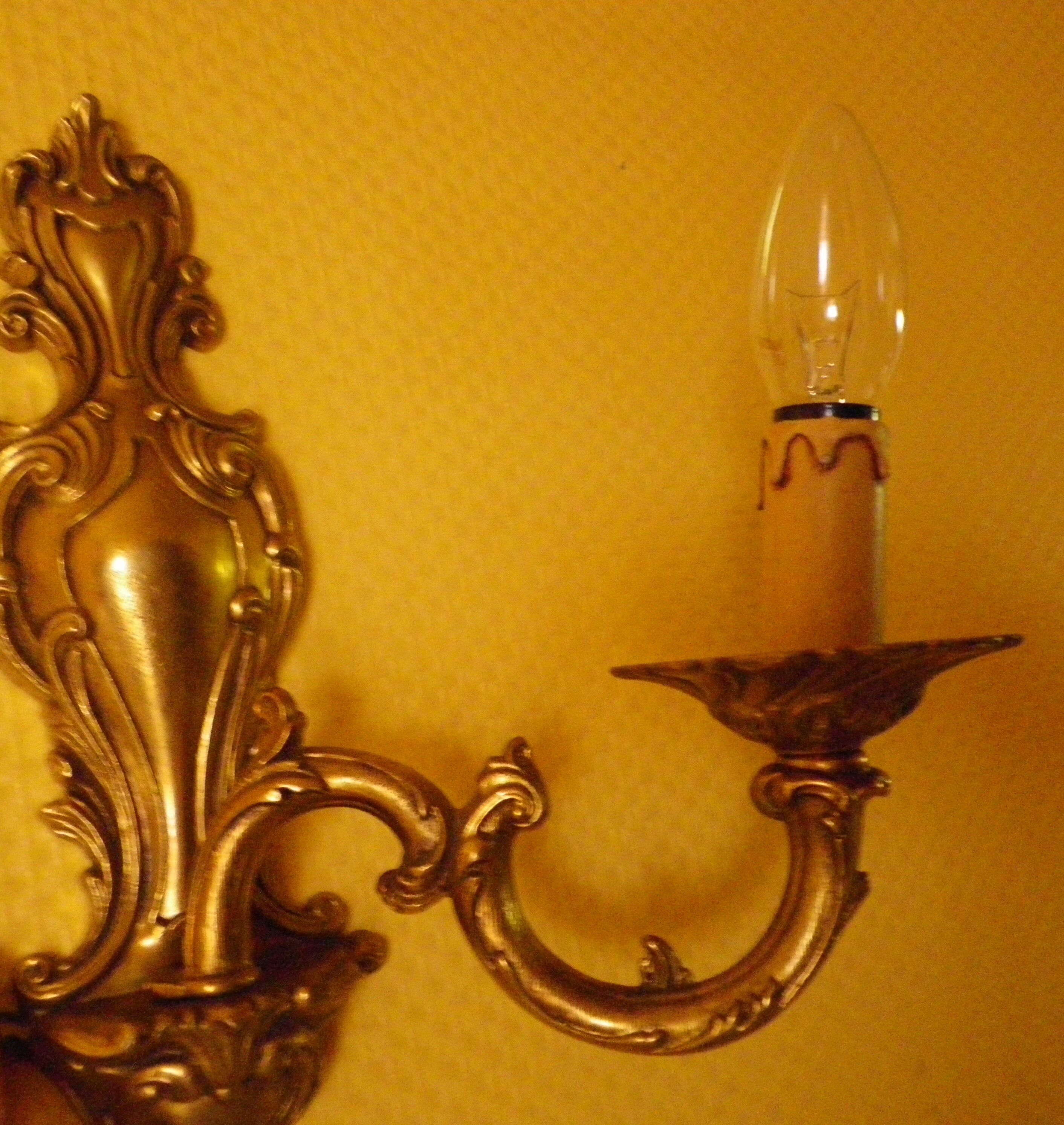 2 "Metra.F" gold-coloured metal flame wall appliques, steerable branch