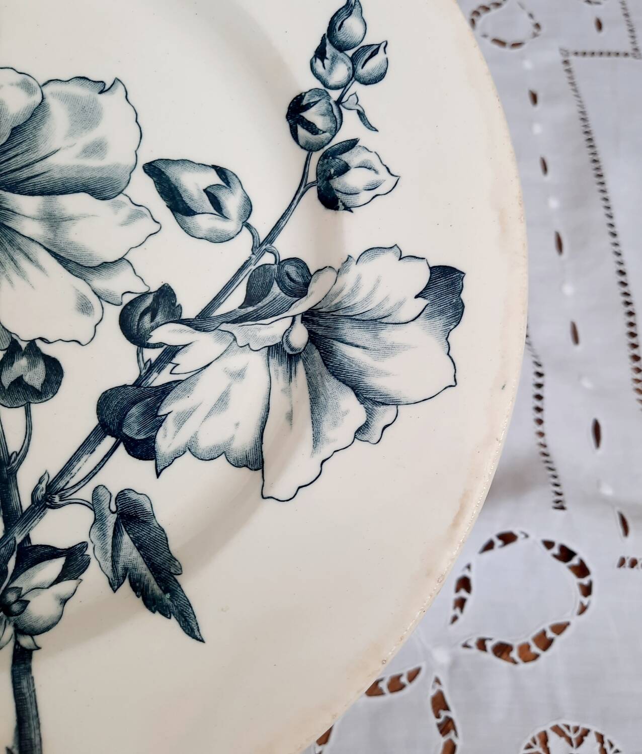 Old mismatched dinner plates accompanied by a dish