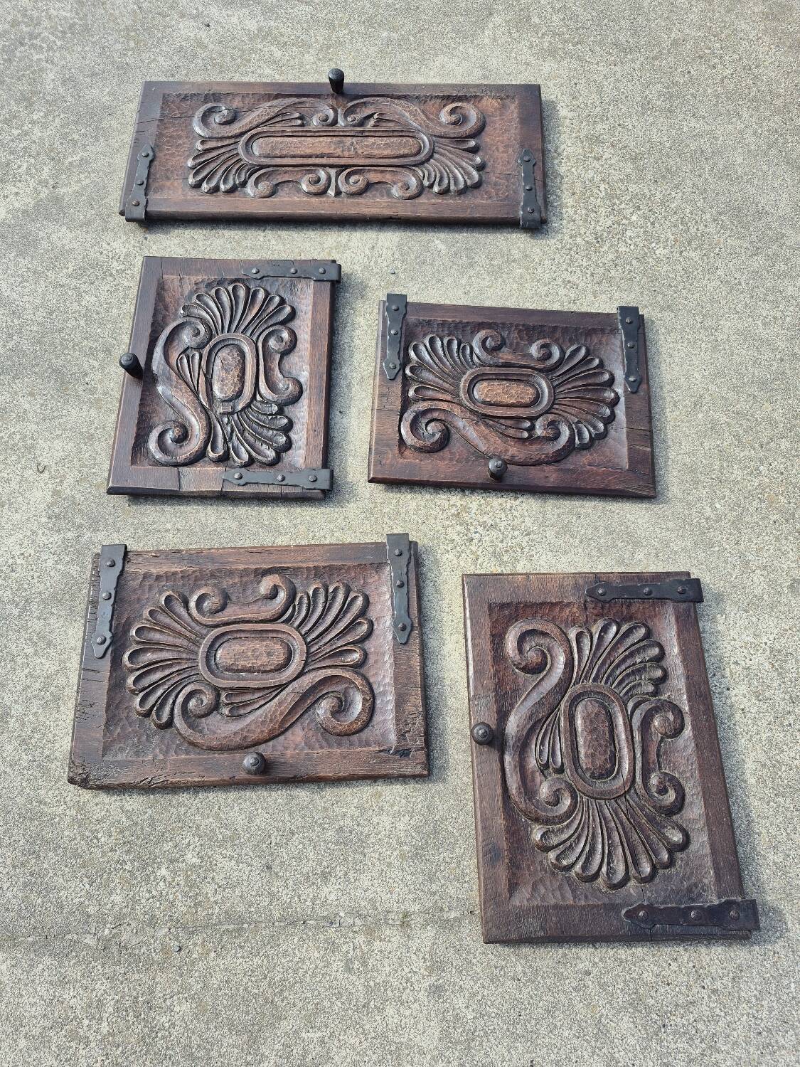 antique cabinet with carvings and wrought iron fittings rural