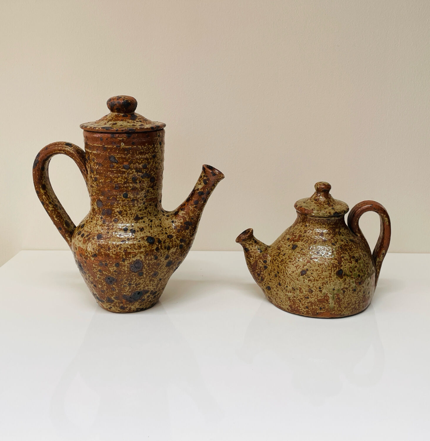 Pair of vintage brutalist ceramic teapots from the 1970s.