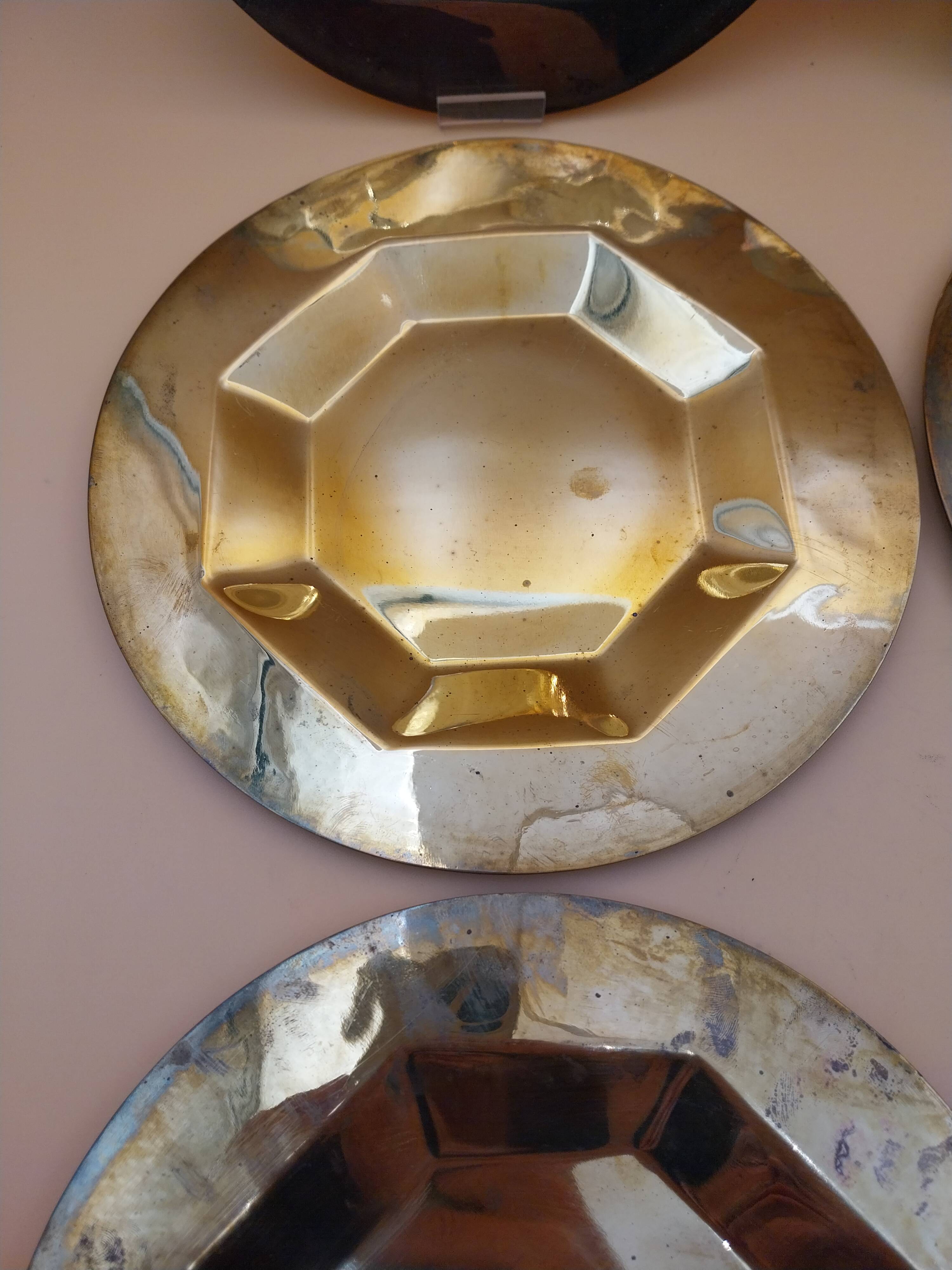 6 brass plates under plates
