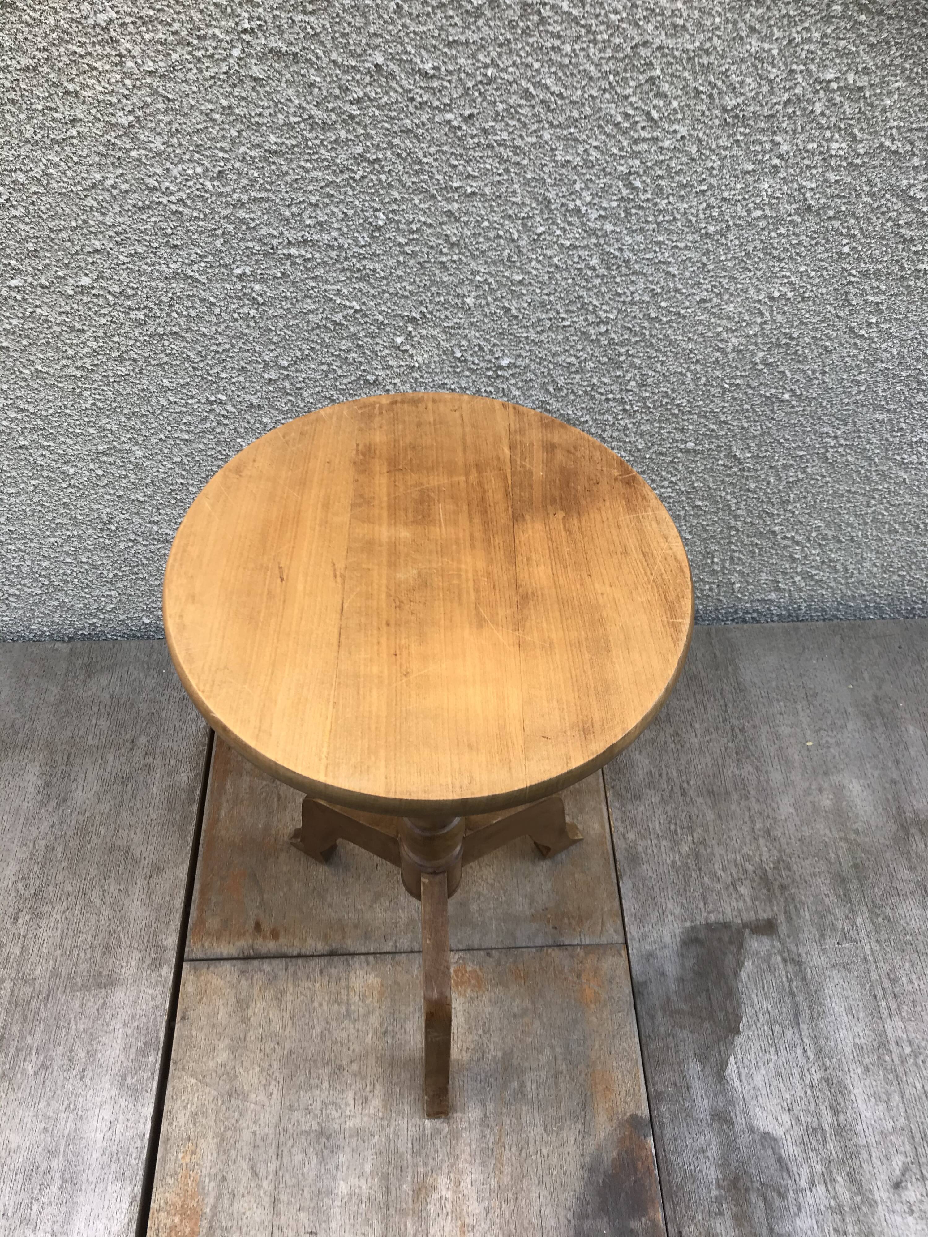 Old vintage wood tripode table
