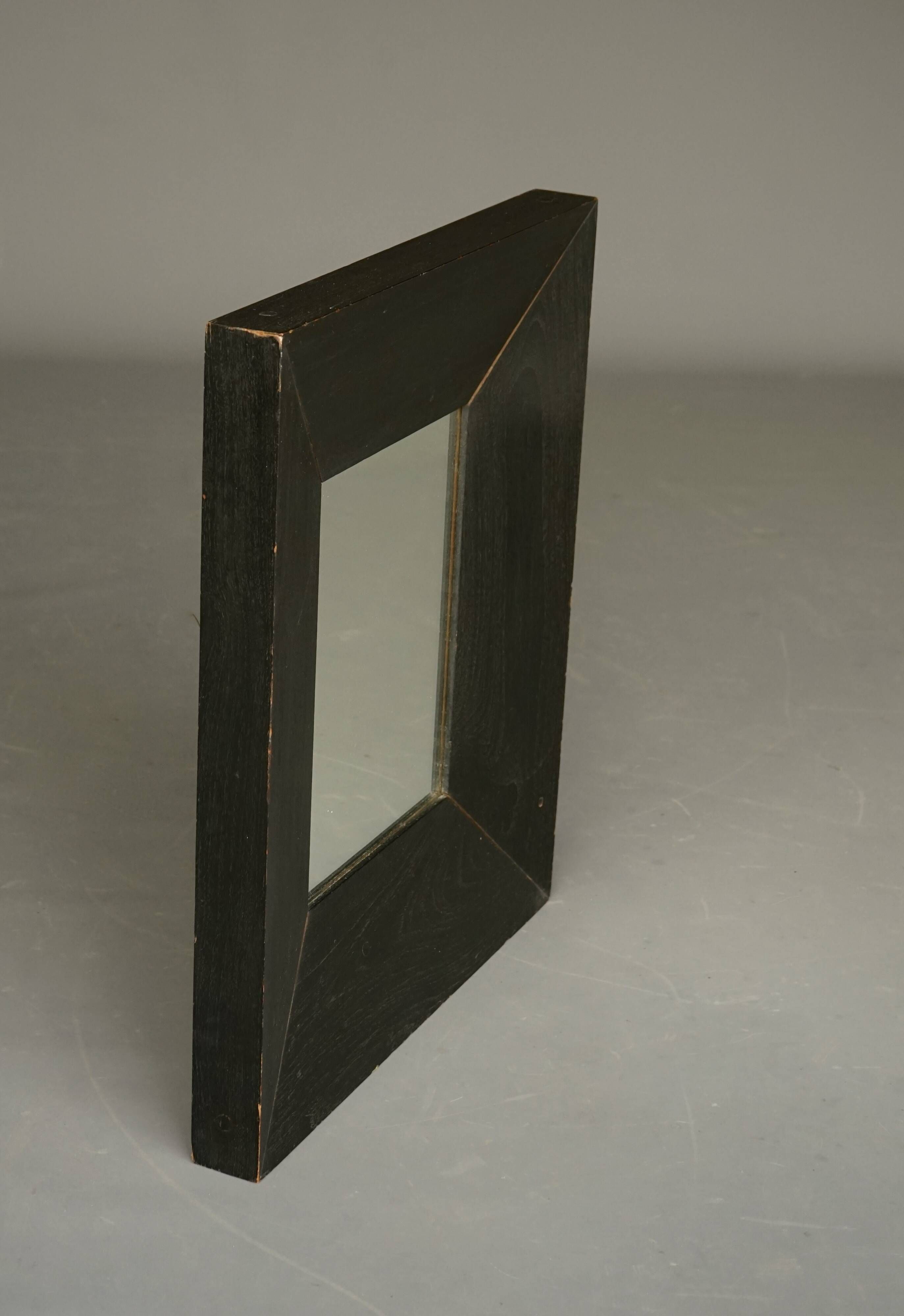 Thick framed vintage wall mirror