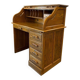 Vintage American wooden desk with a roll-top.
