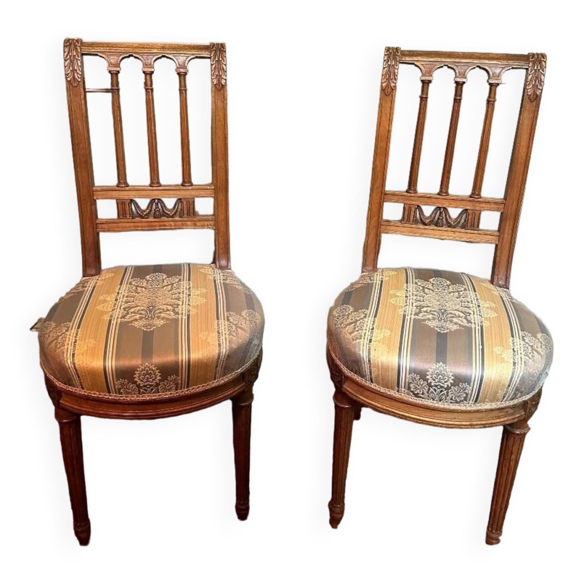Pair Of Louis XVI Style Chairs In Walnut.