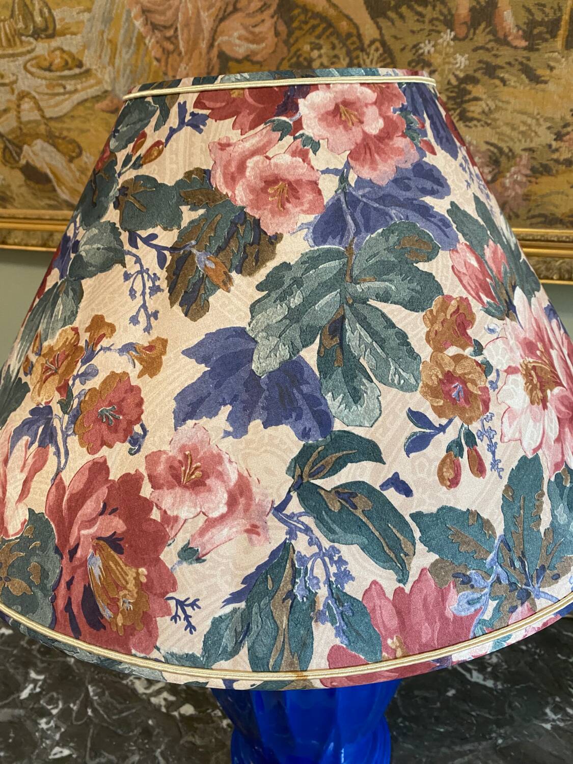 Large blue ceramic lamp with floral shade