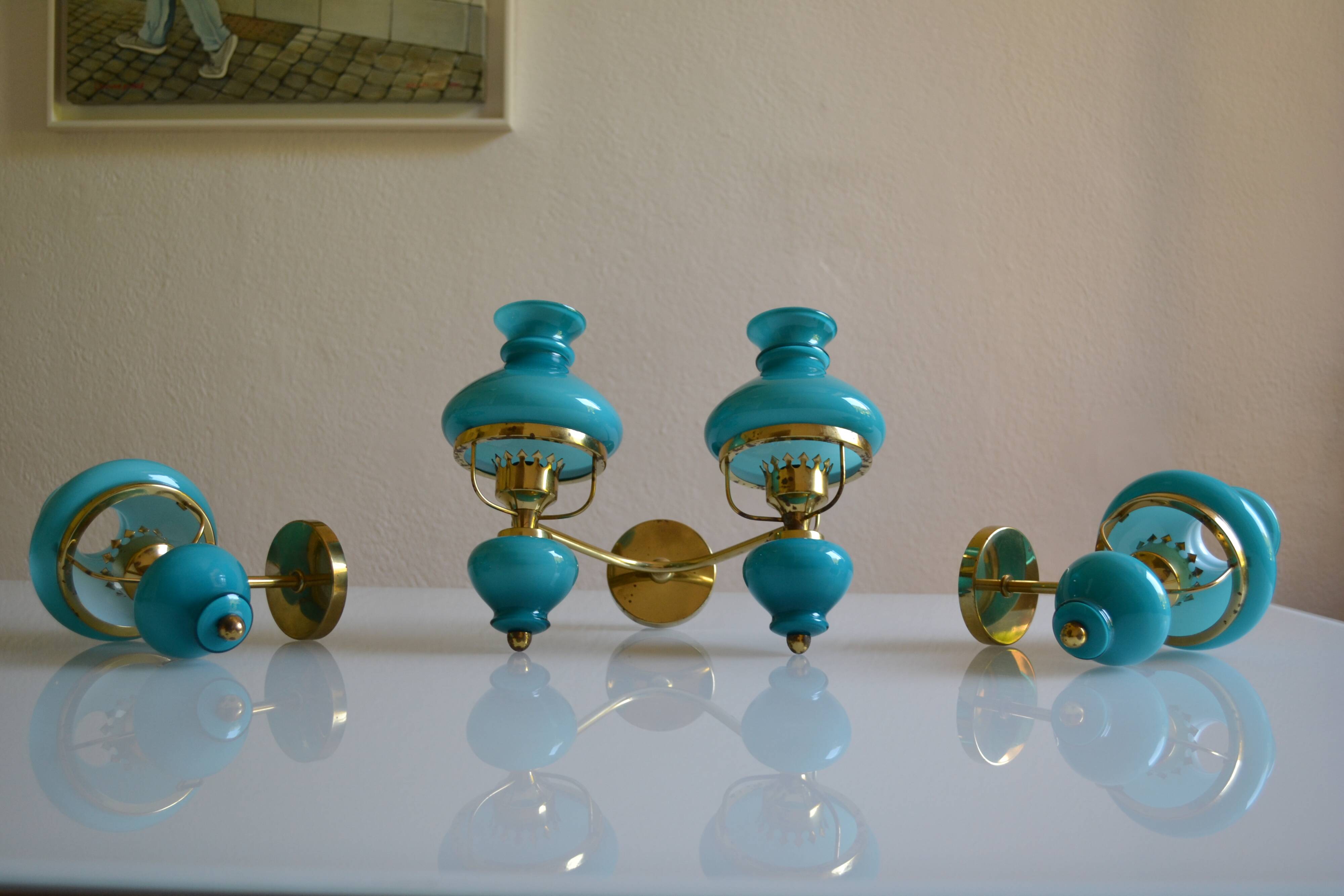 Series of 3 vintage brass and blue opaline wall lamps