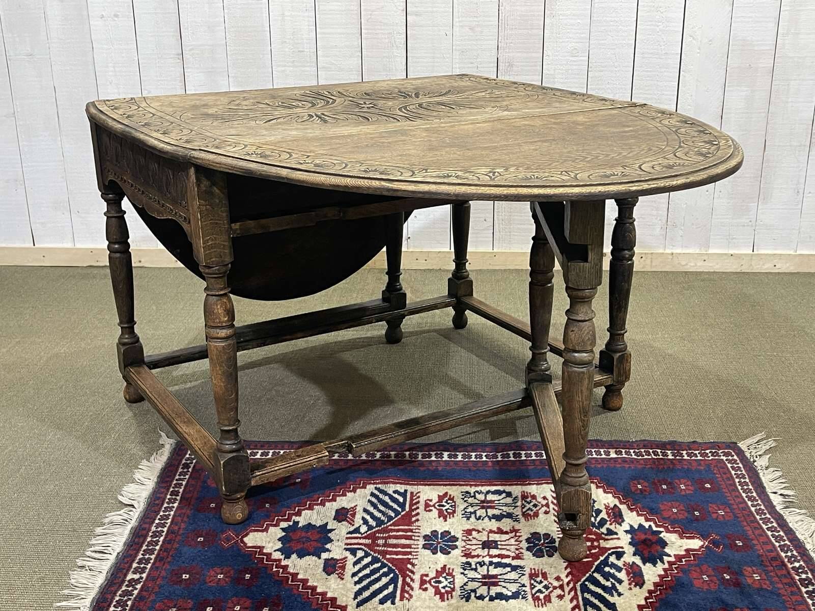 English oak drop-leaf table from the early 20th century