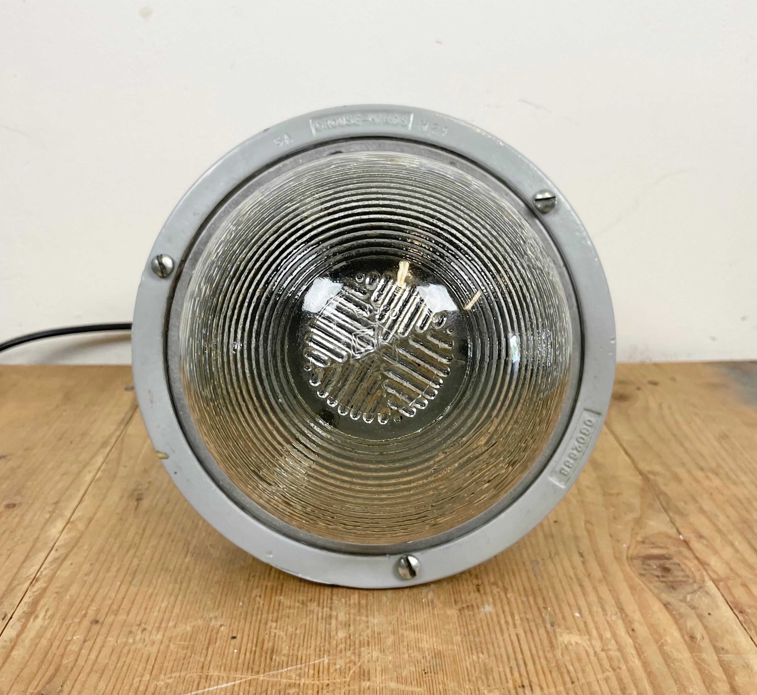 Grey industrial explosion proof light from Crouse-Hinds, 1970s