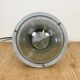 Grey industrial explosion proof light from Crouse-Hinds, 1970s