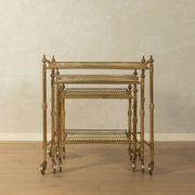 Set of 3 vintage Hollywood Regency nesting tables with brass frame and glass tops (1960s)