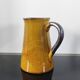 Vintage glazed terracotta pitcher
