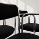 Vintage chairs with double chrome structure and black velvet. 70s