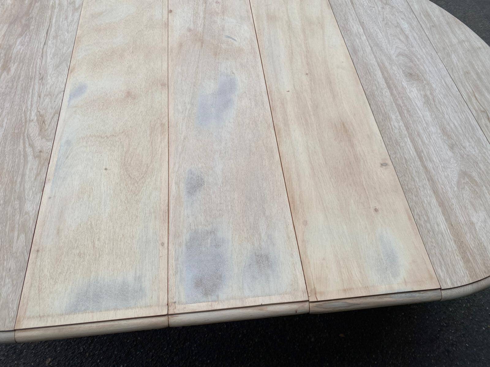 Renovated Louis Philippe round extendable dining table with flaps and 3 extensions.