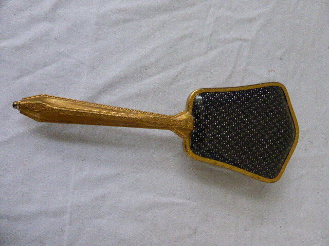 Mirror gold metal of the 1960s