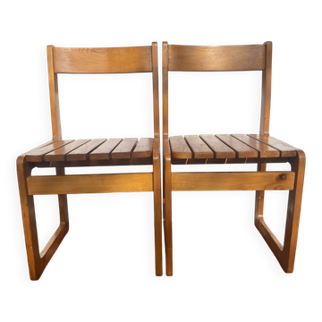 Pair of vintage sled chairs in solid pine