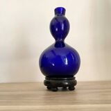 Blue opaline vase, wooden base