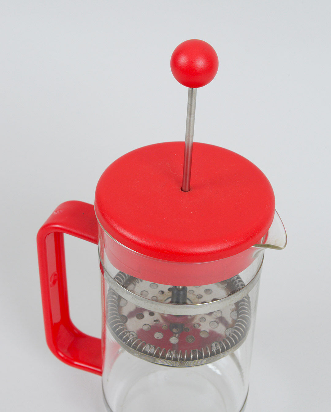 Red Bodum coffee maker