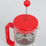 Red Bodum coffee maker