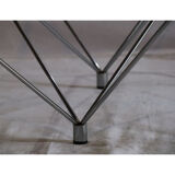 Minimalist coffee table in chrome metal and glass