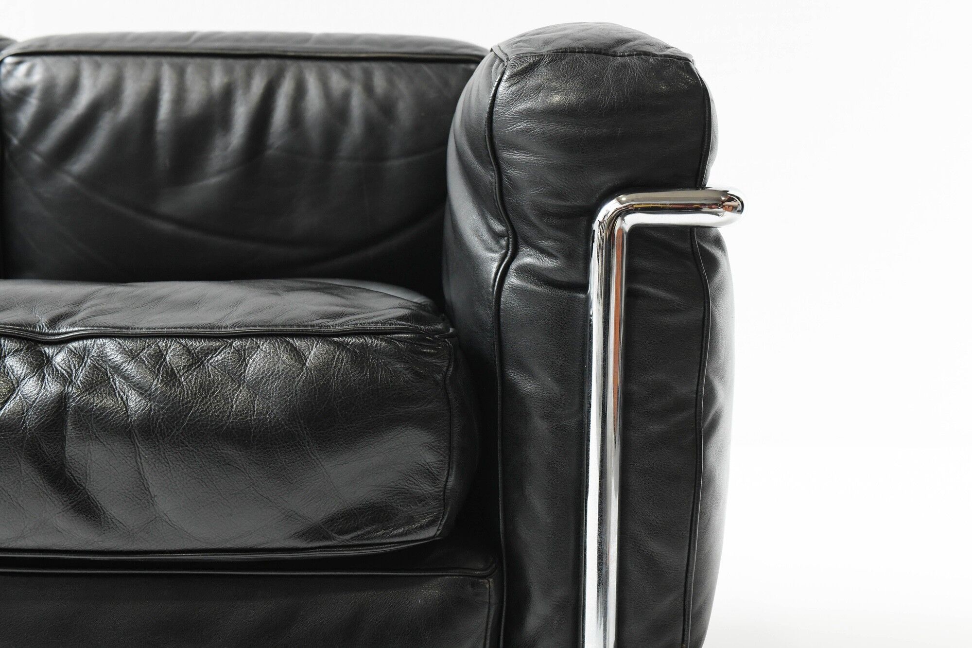 Vintage LC-2 in black leather by Le Corbusier, Jeanneret & Perriand for Cassina