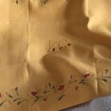 Yellow linen table centre