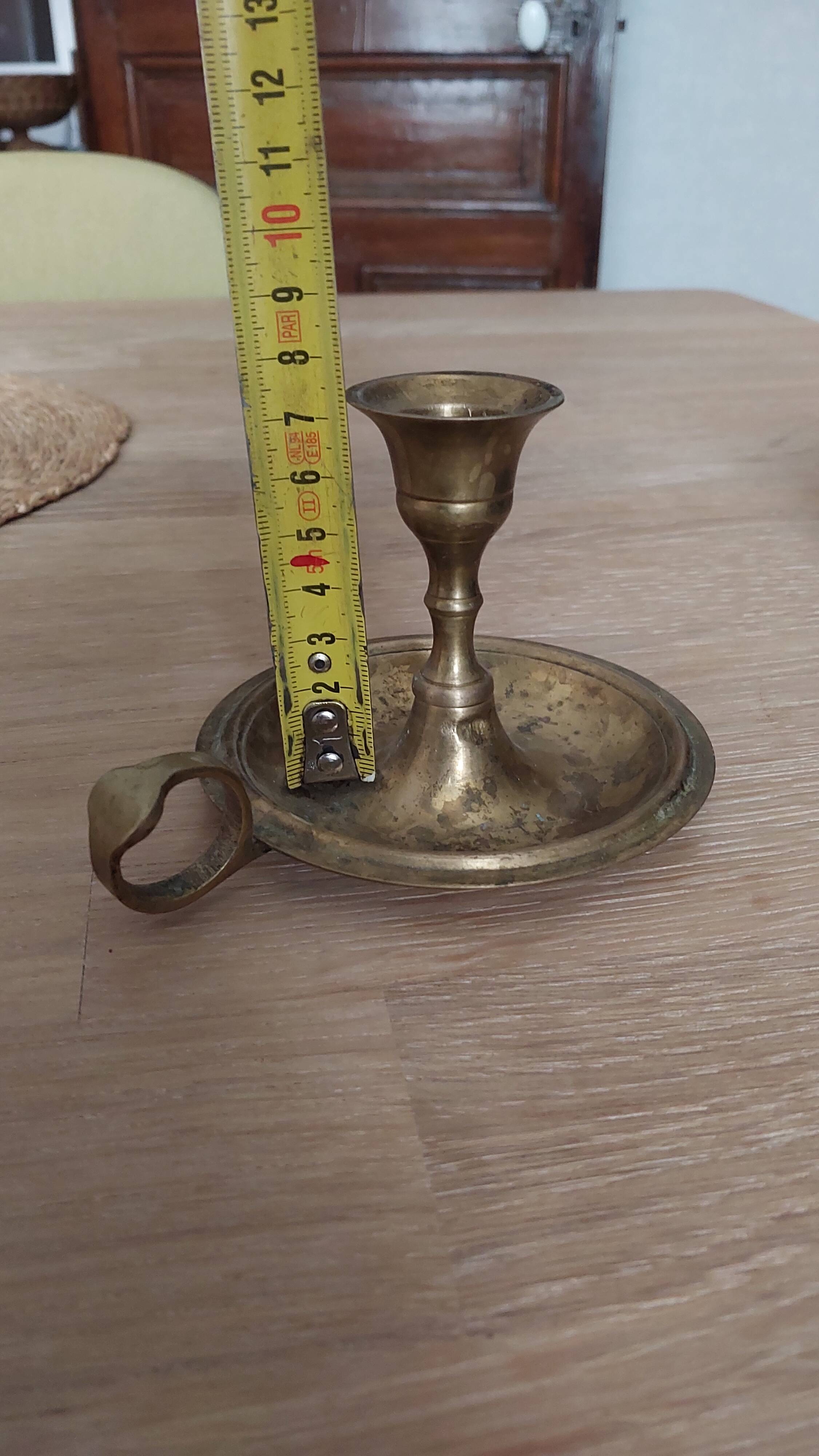 Antique brass candle holder