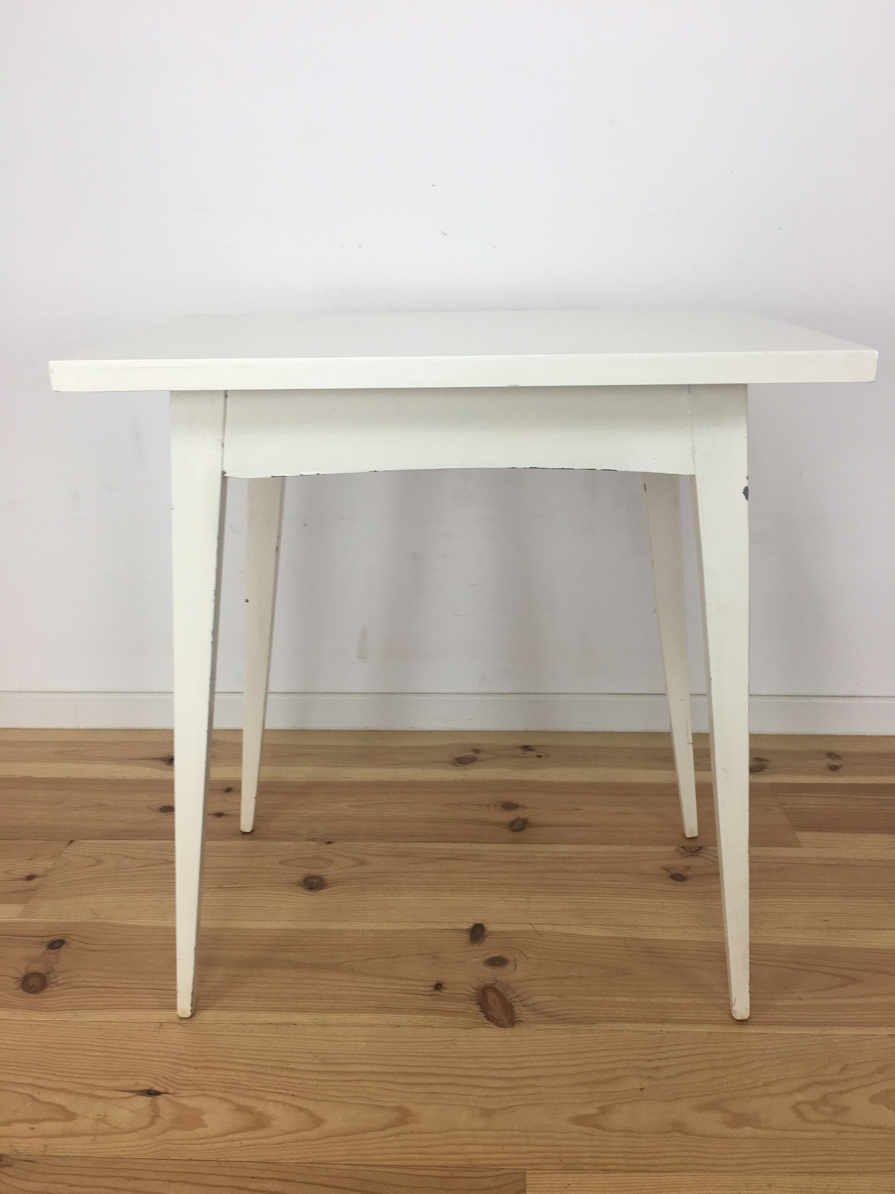 White wood desk foot compass