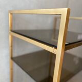 Golden brass and glass shelves