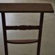 Vintage brown wooden kneeling stool, Hungarian kneeler from the 1940s.