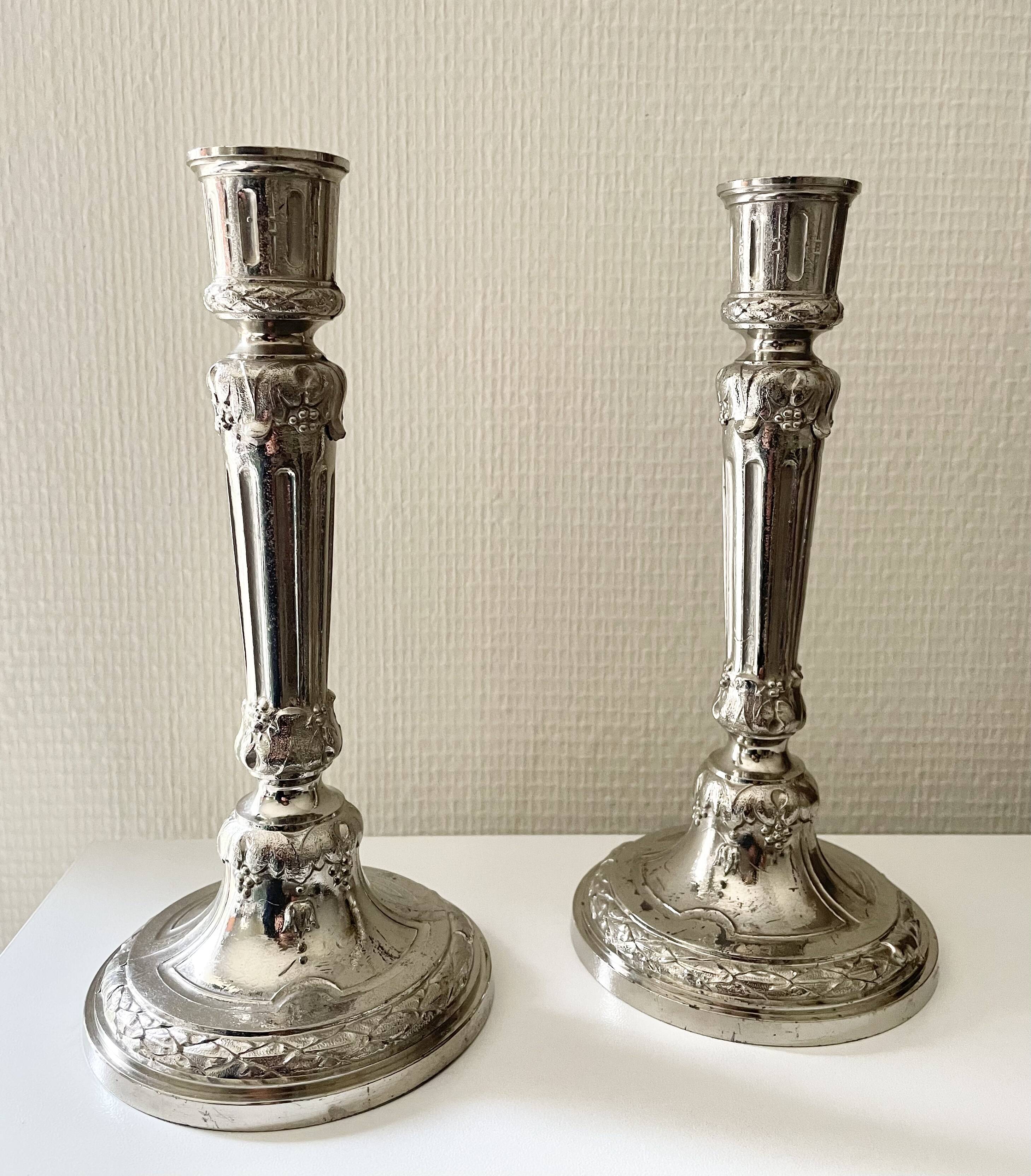 Antique silver-plated candlesticks in classic style