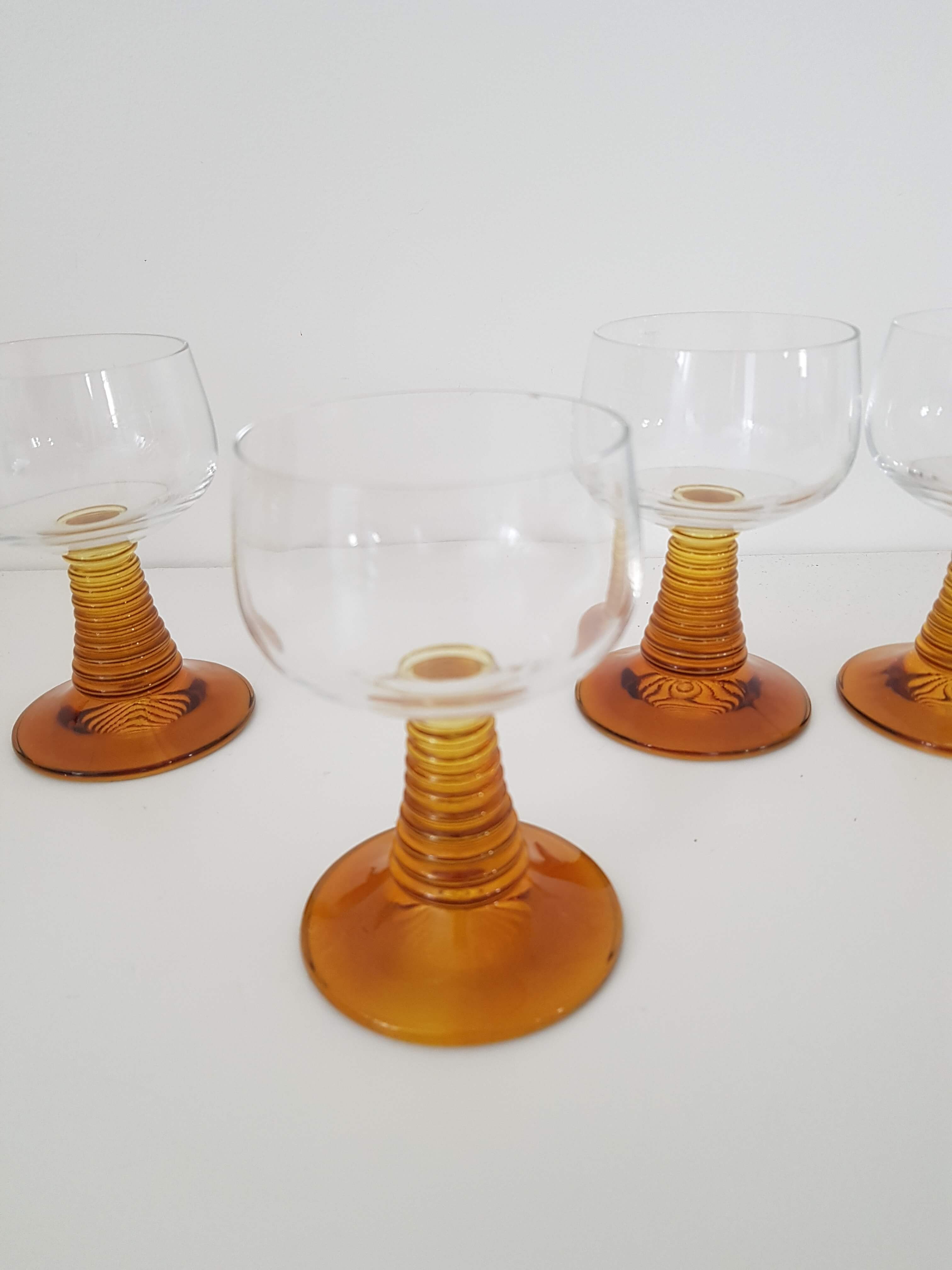 4 vintage foot glasses