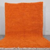Handmade traditional natural wool rug in orange, size 1.5/2.5 m.