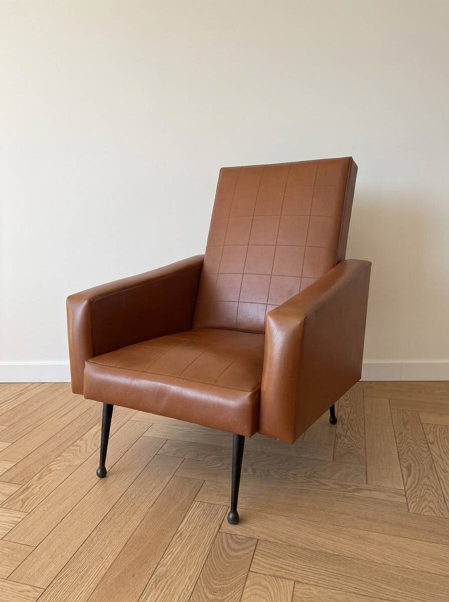 Vintage 1950s brown faux leather armchair