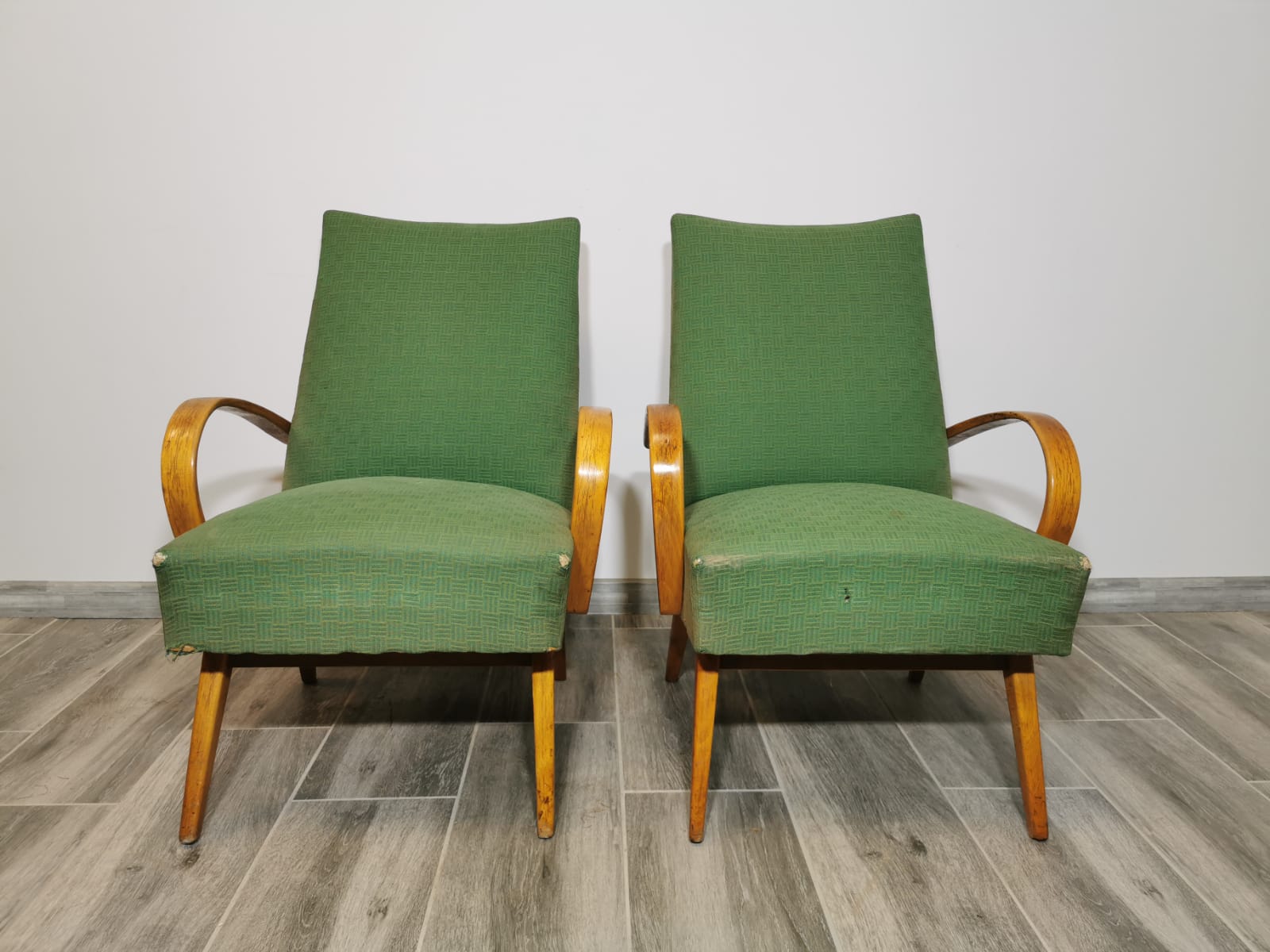 Armchairs by Jaroslav Smidek