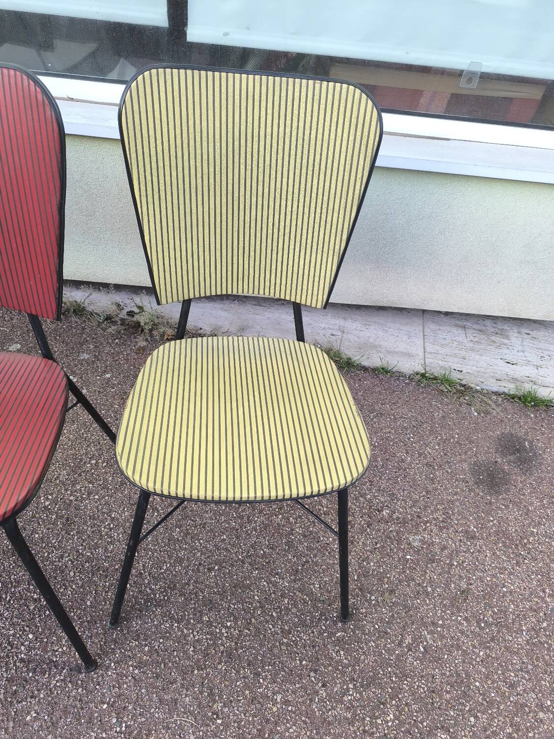 Set of 3 vintage yellow and red faux leather chairs.