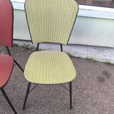 Set of 3 vintage yellow and red faux leather chairs.