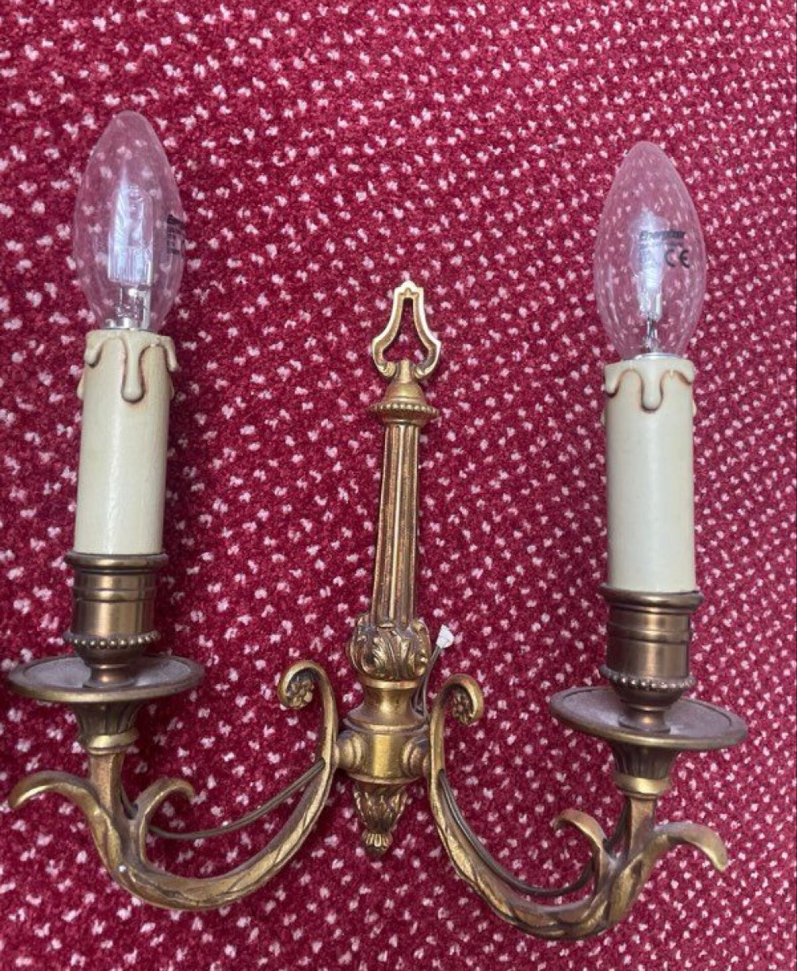 two brass wall sconces