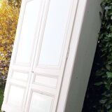Pair of cupboard doors and old woodwork frame